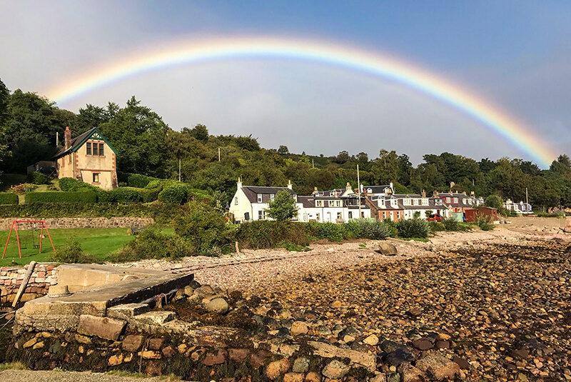 A rainbow over Corrie looking towards Bluebell